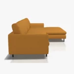 freistil 134 Sofa mit XL-Longchair in der Breite ca. 314 cm aus der seitlichen Perspektive im Stoff-Bezug 4027 goldgelb