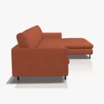 freistil 134 Sofa mit XL-Longchair in der Breite ca. 314 cm aus der seitlichen Perspektive im Stoff-Bezug 6318 rotorange